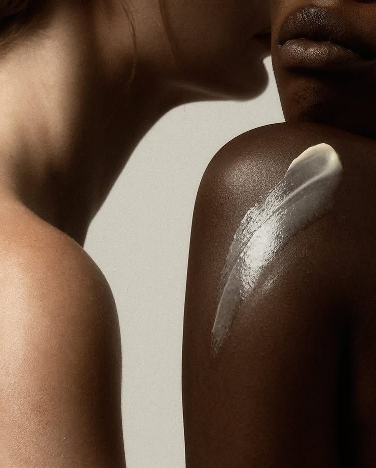Moisturiser applied to richly toned skin