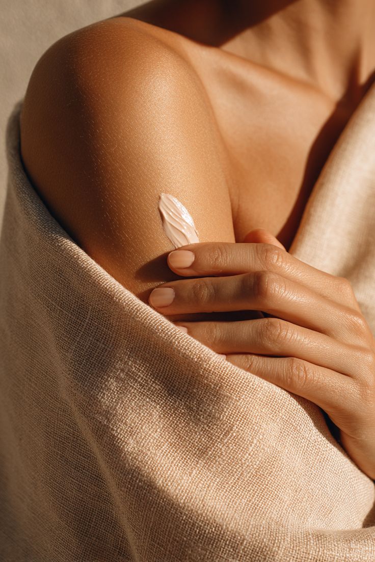 Close-up of moisturised skin in warm natural light